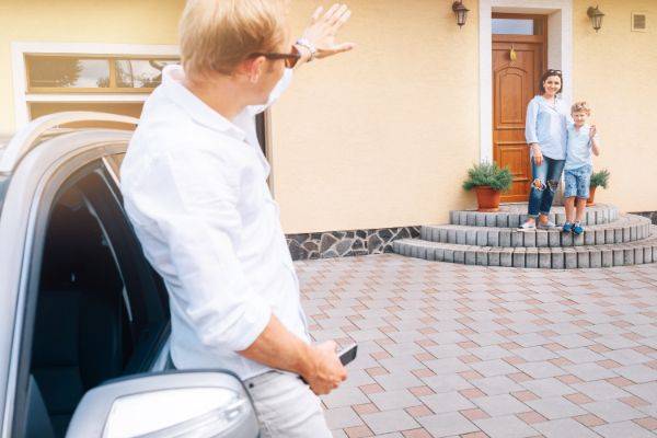 Father leaving son with mother after visit