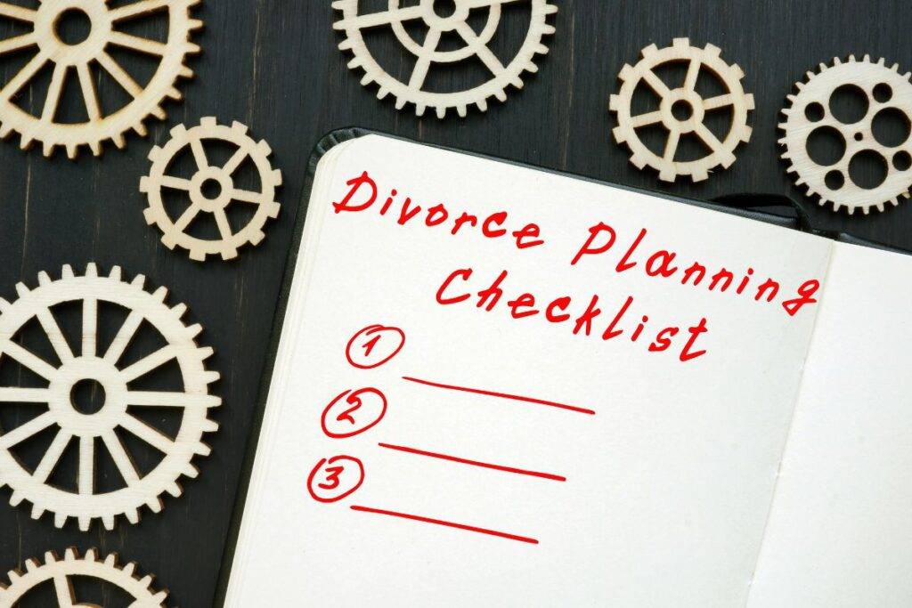 Divorce Planning checklist written in a journal.