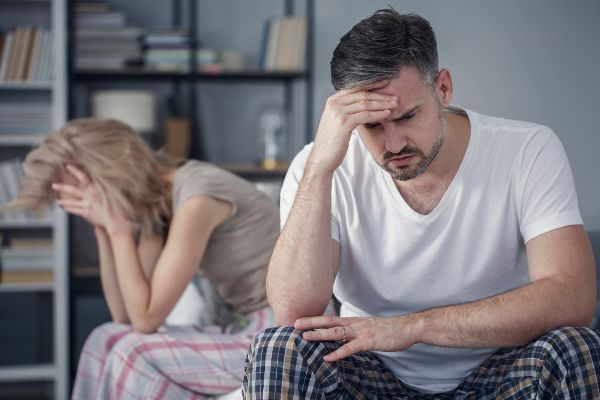 Man and women arguing and upset