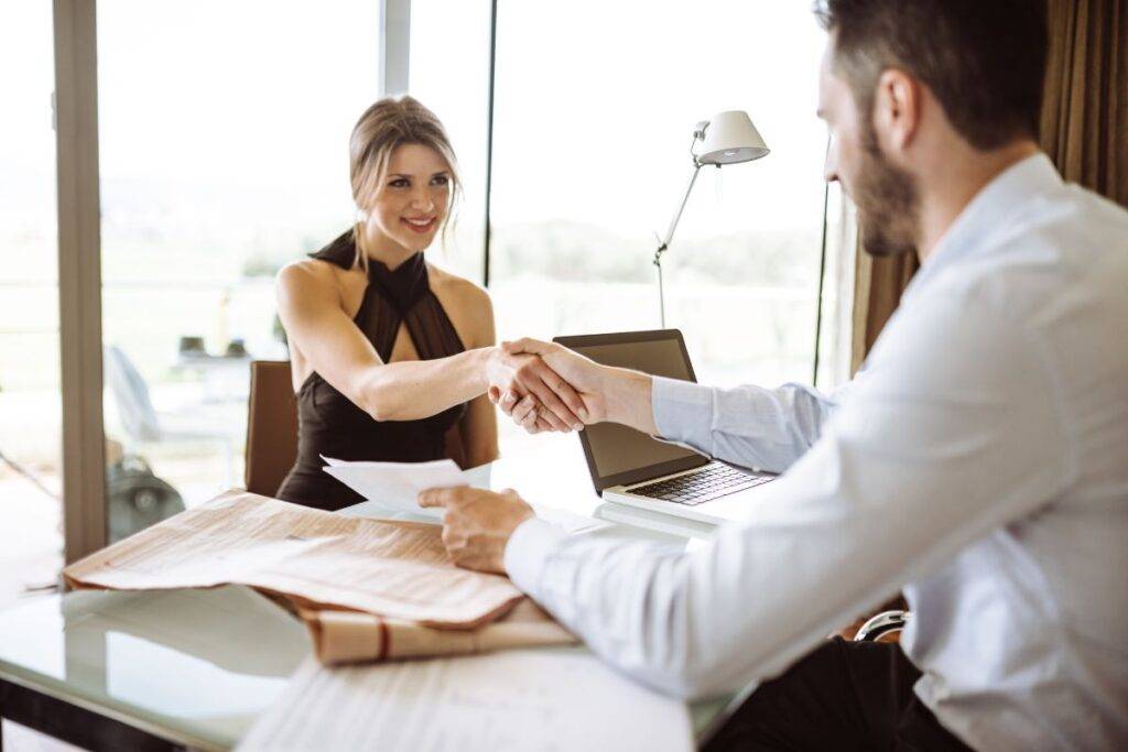 Woman speaking with an attorney.